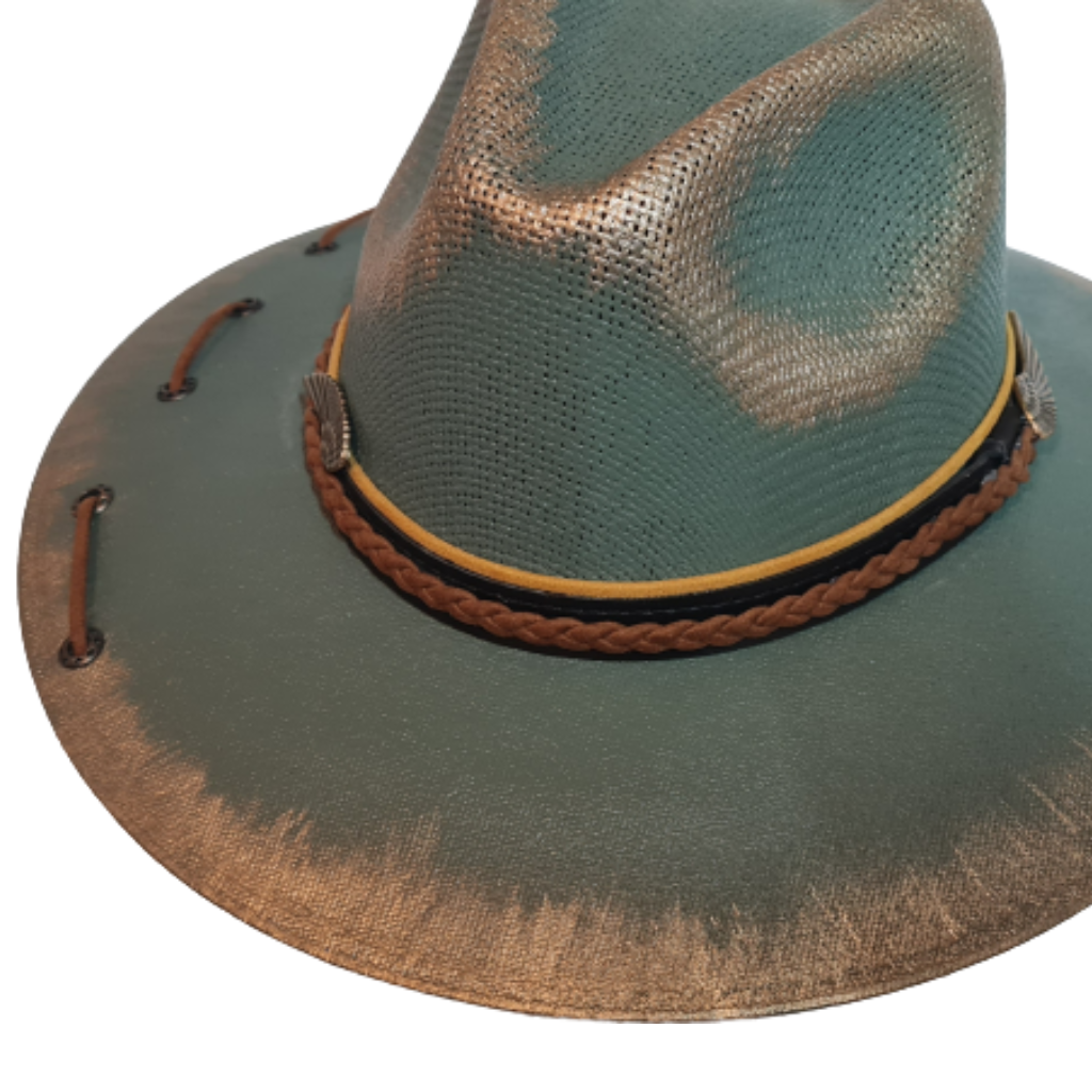 Teal hat with gold decorated with ribbons