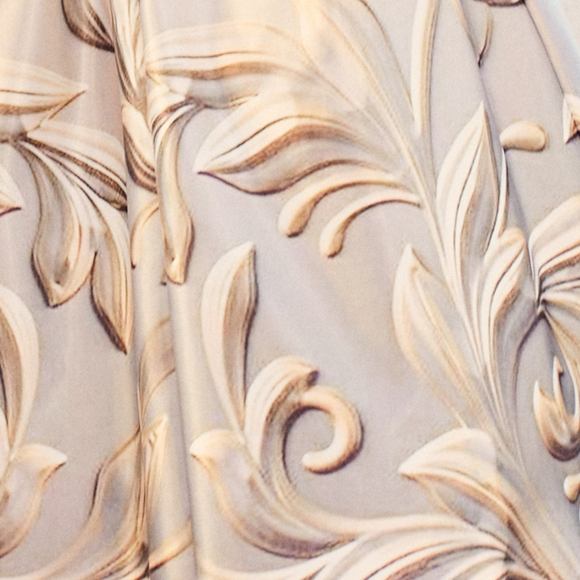 Vestido midi de tirantes color marfil con estampado ocre